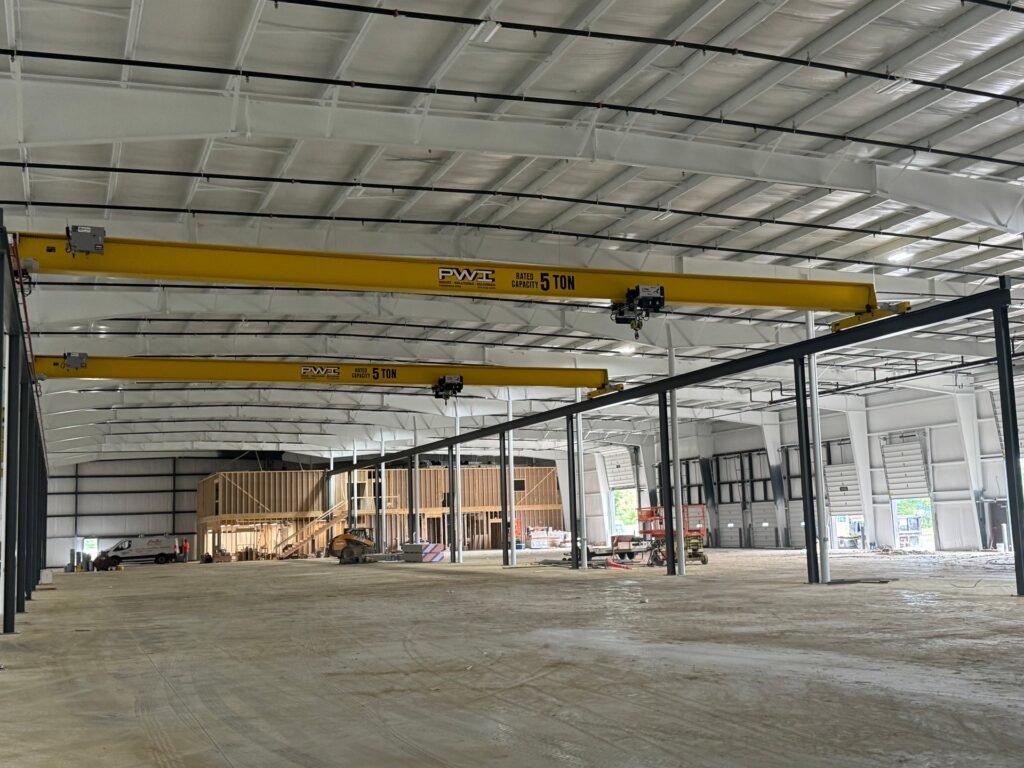 2 5 Ton Top-Running Overhead Cranes in Warehouse Setting